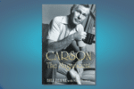 The cover to Carson the Magnificent, showing Johnny Carson in a casual white polo shirt holding a cup of coffee. He has light-toned skin and sits on a couch.