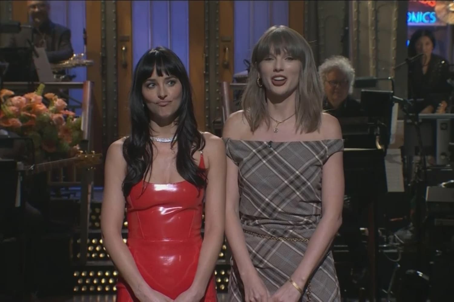 Taylor Swift Drops in on Dakota Johnson’s SNL Monologue—Watch